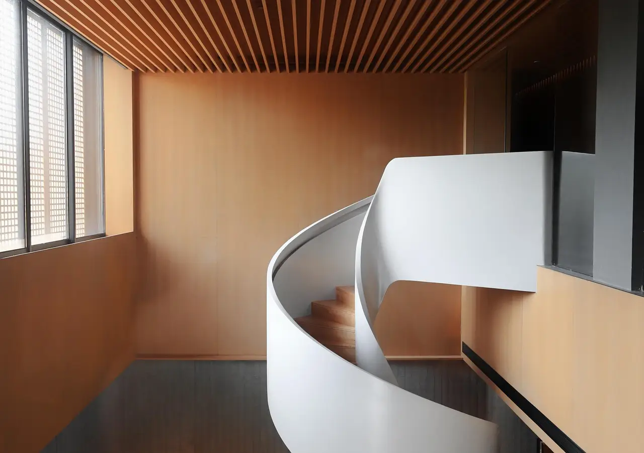 At the Shanghai Grand Opera House, the Gravity-Defying Staircase Was Designed to Look Like a Hand Fan